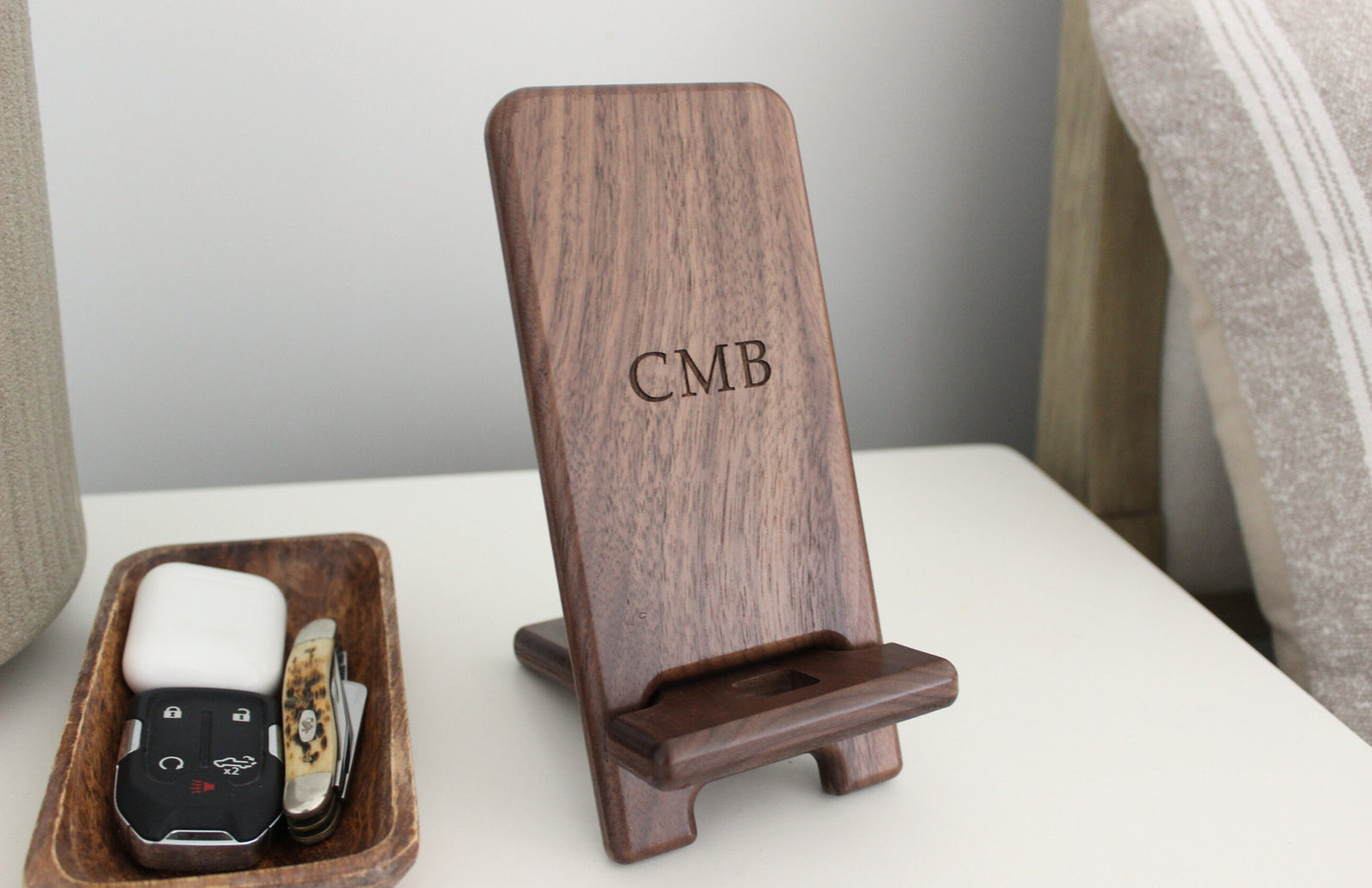 Personalized phone holder and charging station. Custom engraved to order